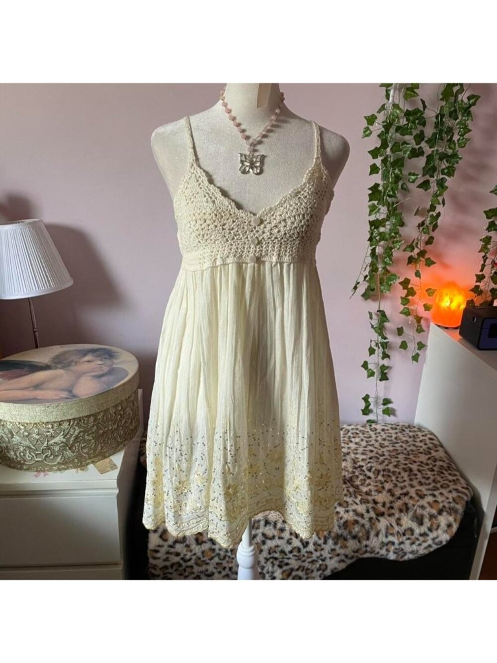Cream babydoll dress with delicate floral embroidery and sequin details